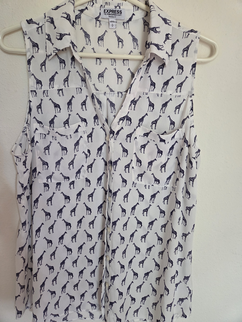 Express White Sleeveless Blouse with Black Giraffe Print